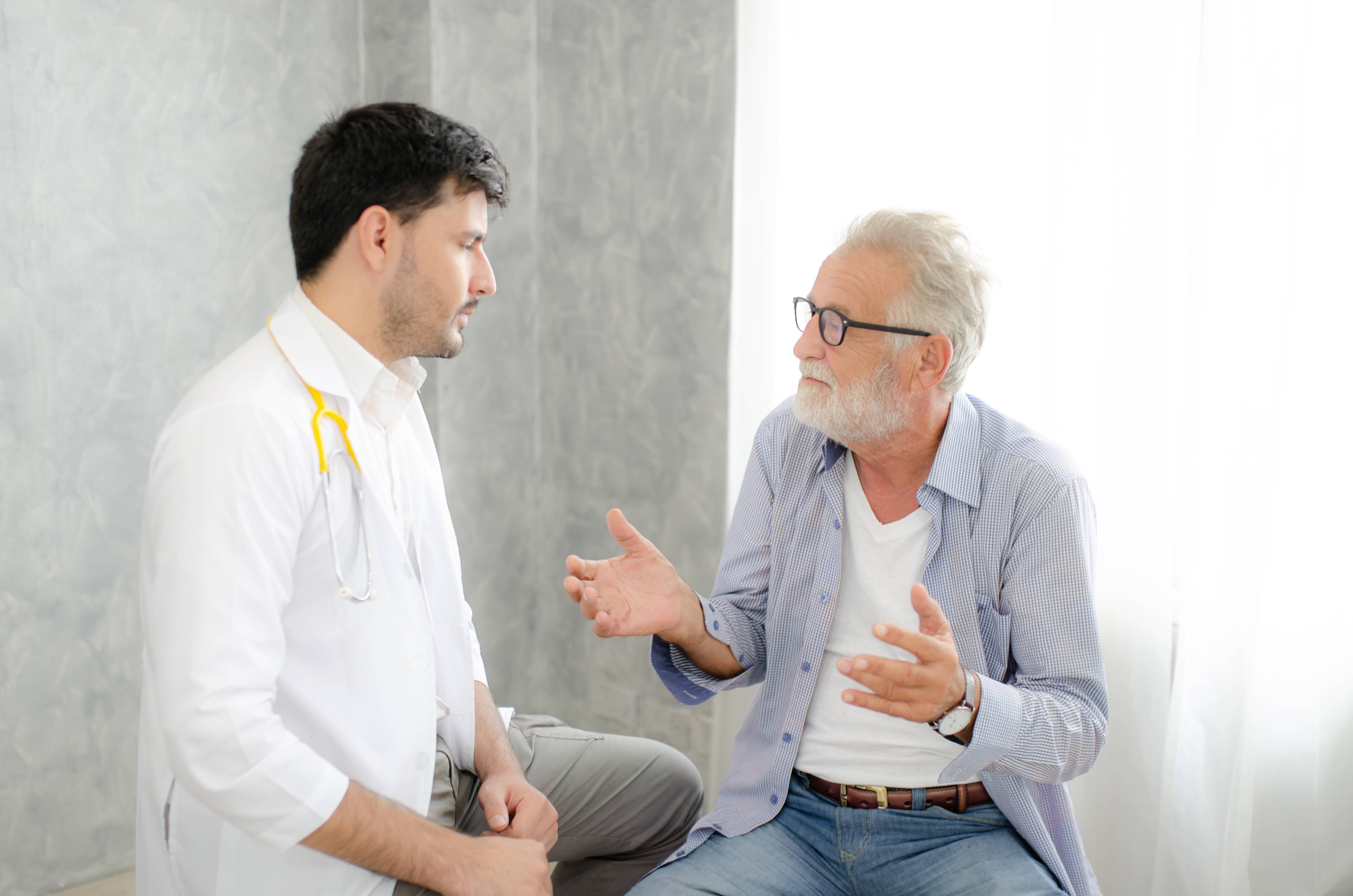 Radiotherapist talking to patient