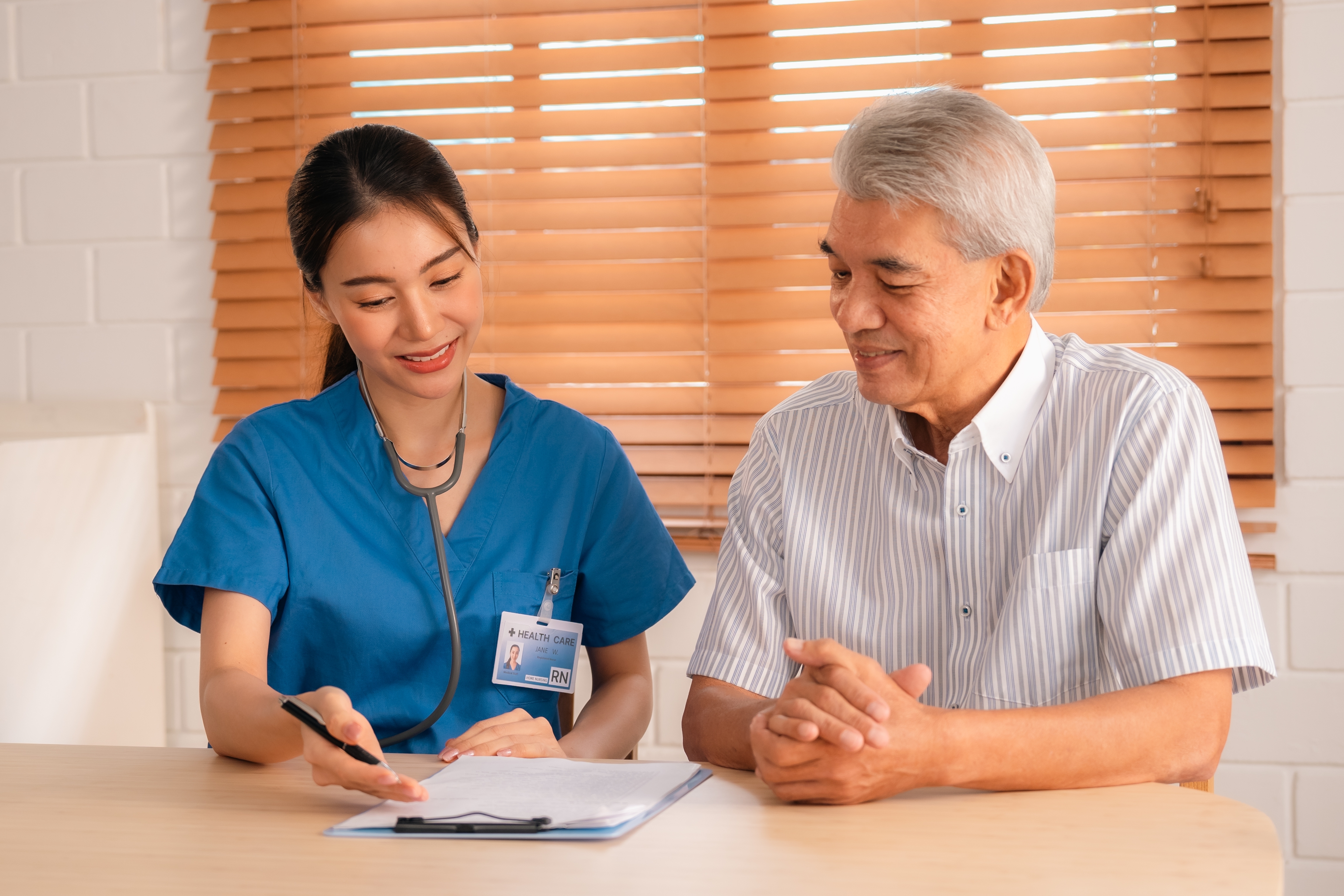 nurse talking to patient