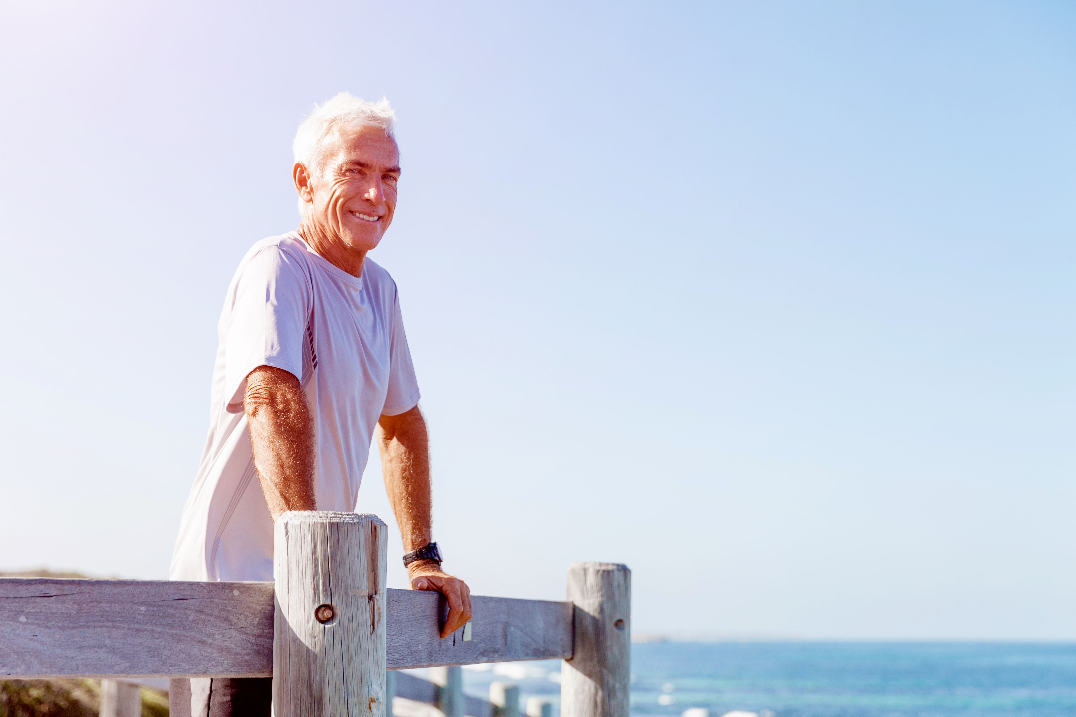 Man standing looking out to seaside